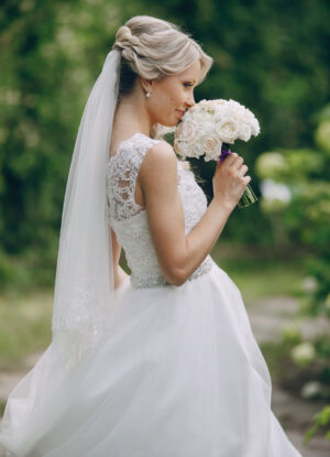 Bride wearing a veil and white wedding dress