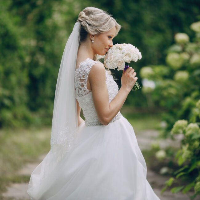 Bride wearing a veil and white wedding dress
